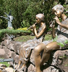 Strassacker sculpture garden with flute players